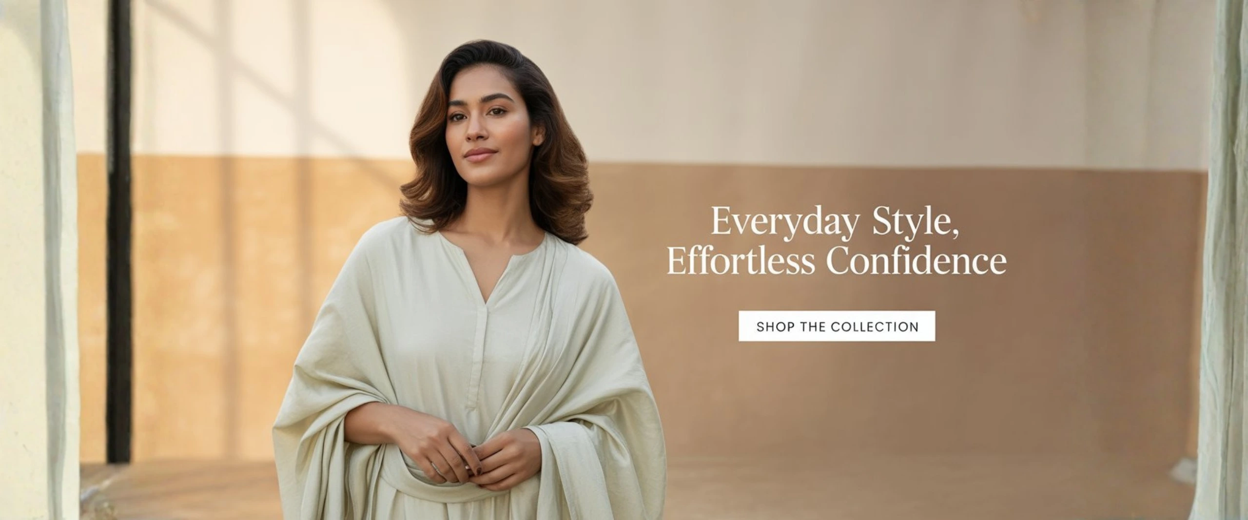 Elegant Indian woman wearing a premium PRYOM kurti pant set in soft neutral tones, representing timeless modern ethnic fashion